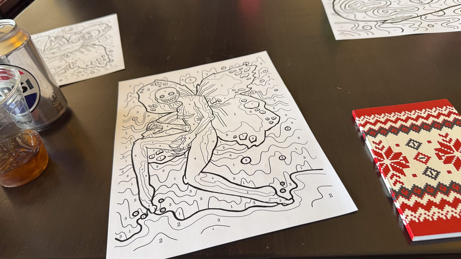 A photo of a coloring book page for Forgery