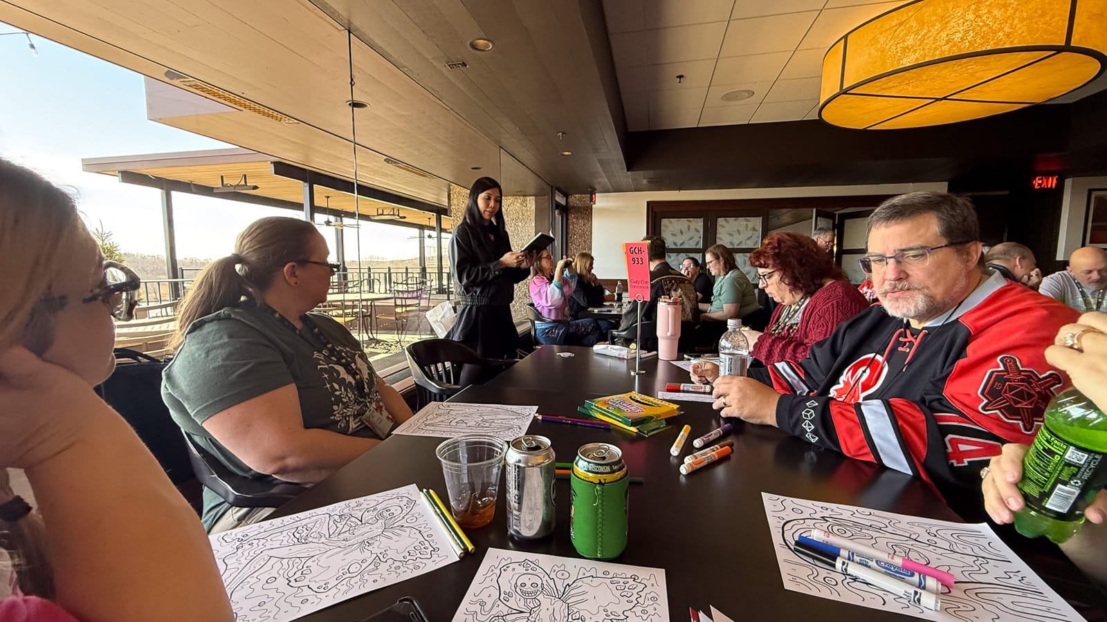 A photo of players of Forgery and the author, Banana Chan, at GaryCon