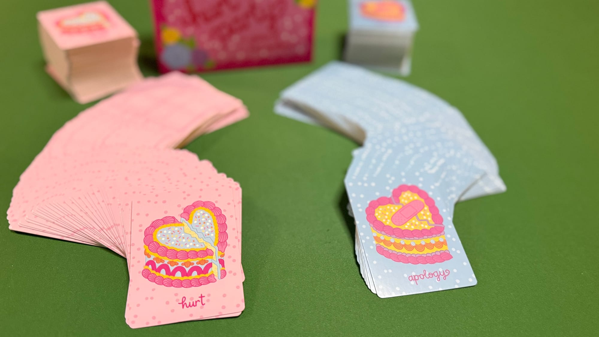 Two decks of cards: hurt & apologies