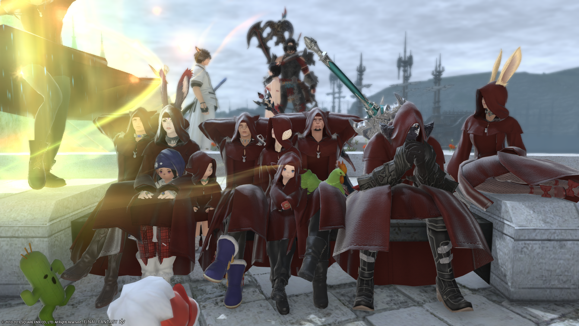 A large group of characters in Limsa Lominsa all wearing blood red robes. 