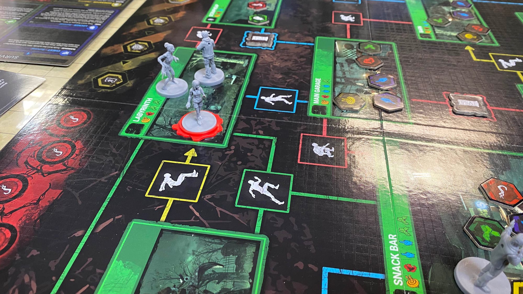 The Hag in the same space as an injured Feng Min. This alternate map lets them both access three different spaces from here along green paths.