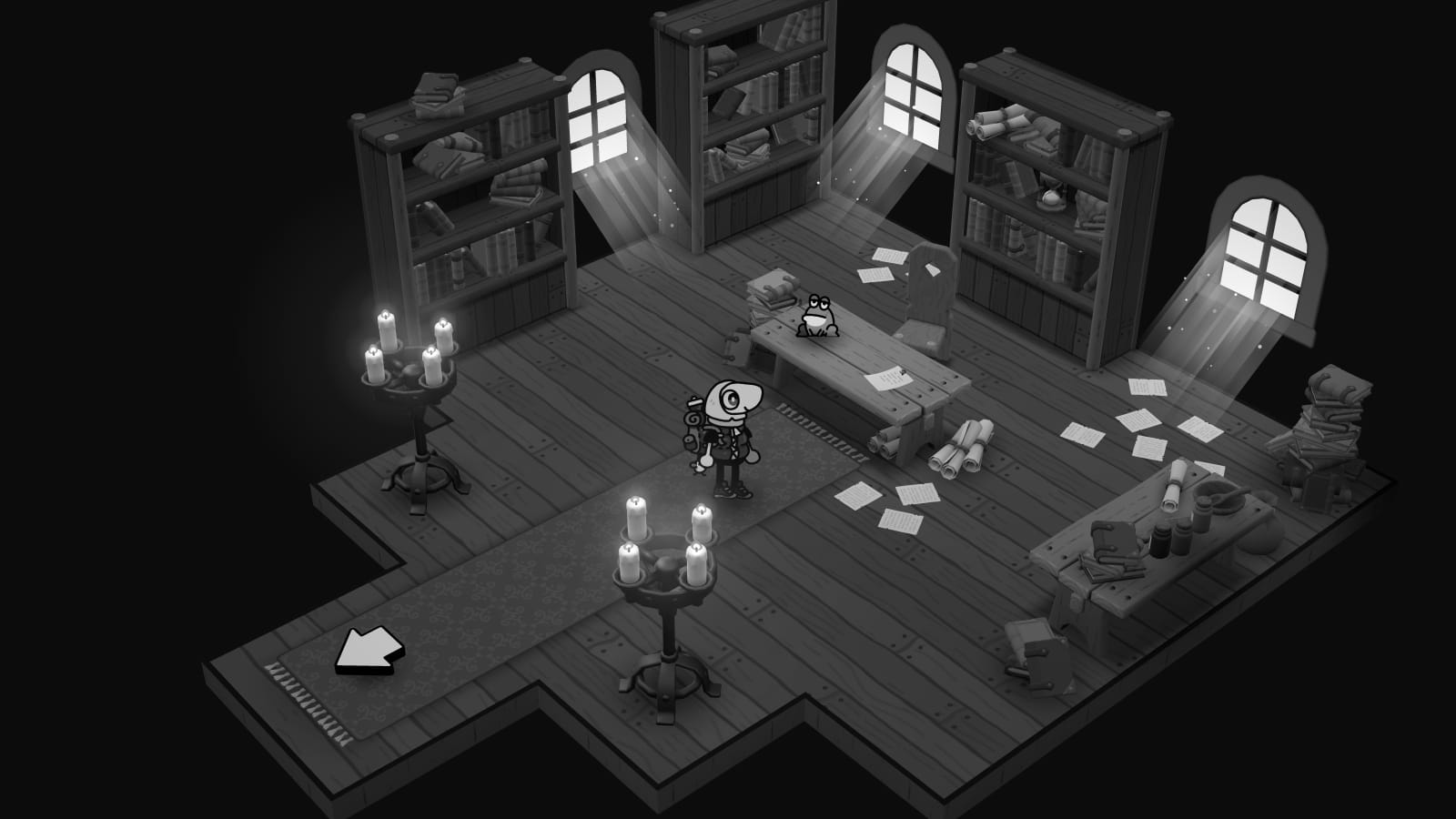 A study, with a frog sitting on the desk.