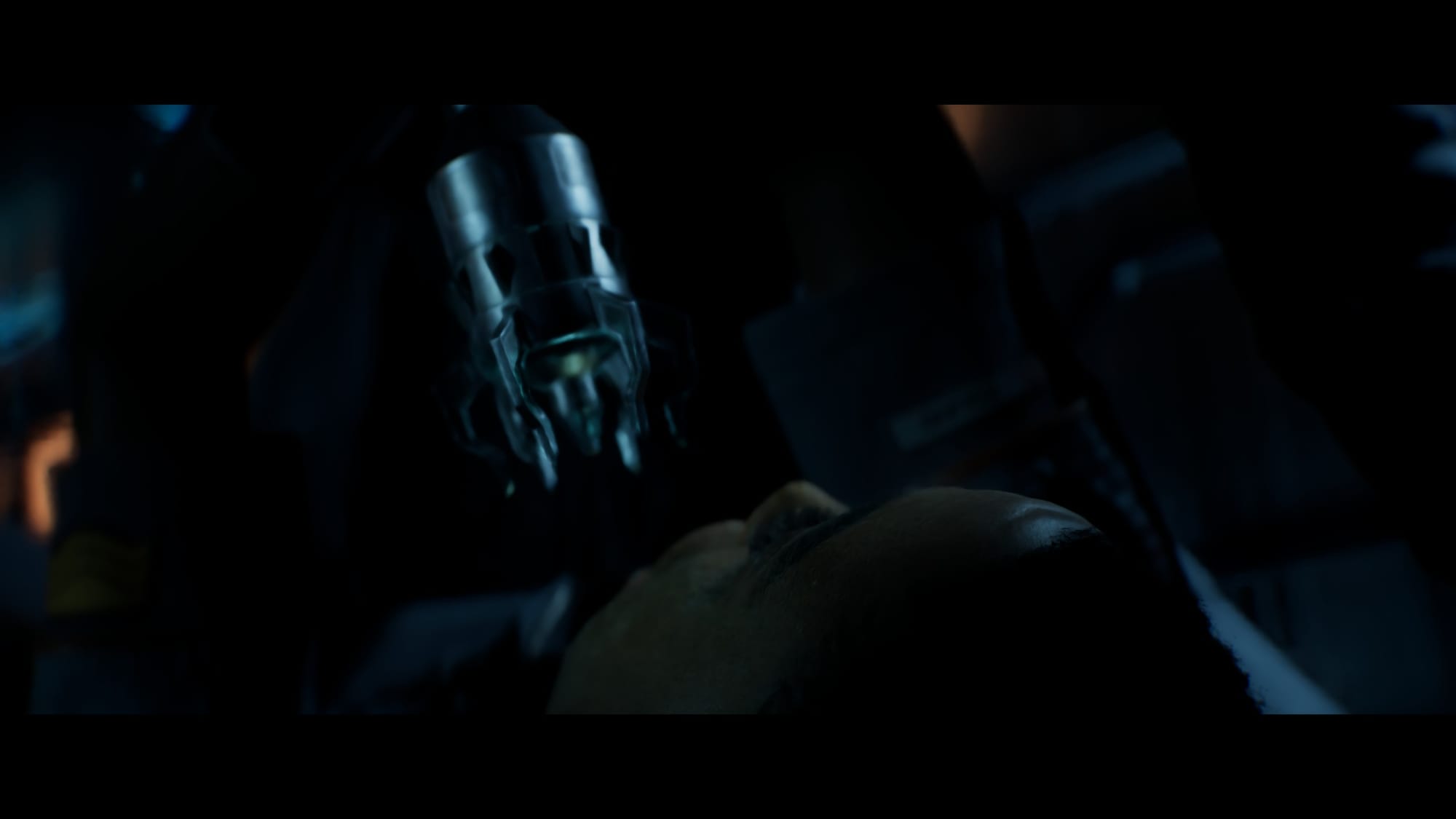 A monster about to rip out a character's eye. 