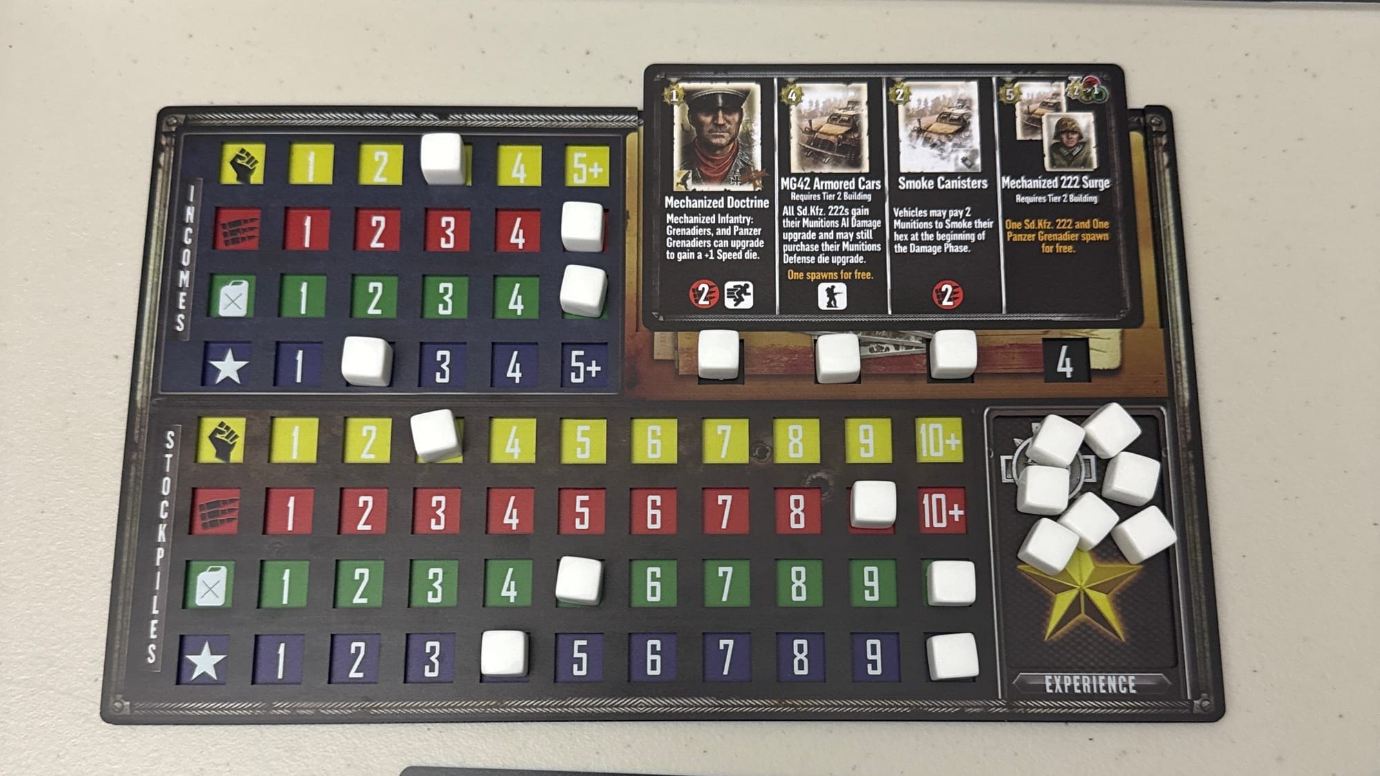 A player board for tracking resources, income, and commander unlocks.