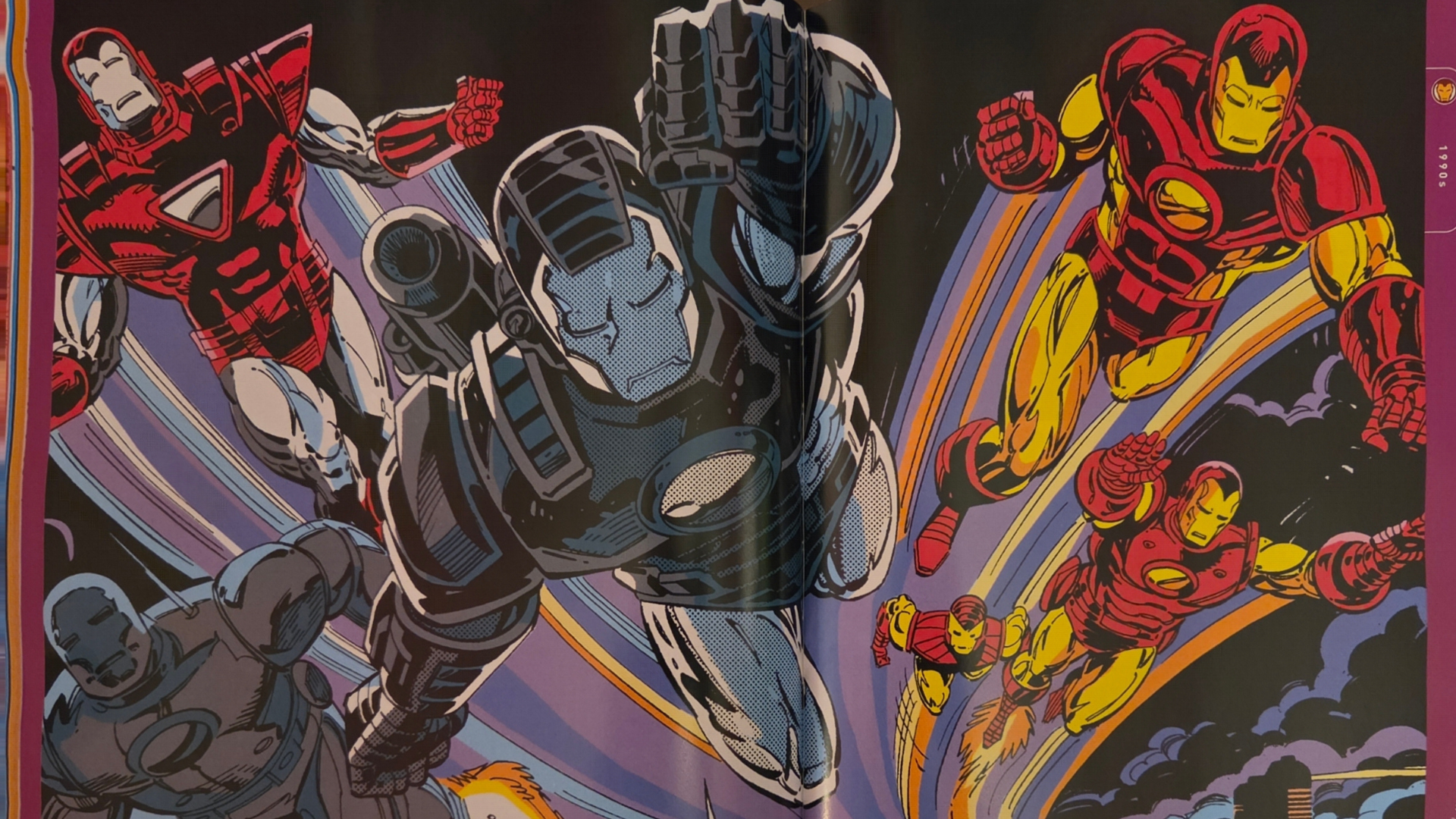 War Machine flies into battle alongside a legion of Iron Man armors on this two page spread in Marvel's Iron Man: The First 60 Years from Titan Comics.