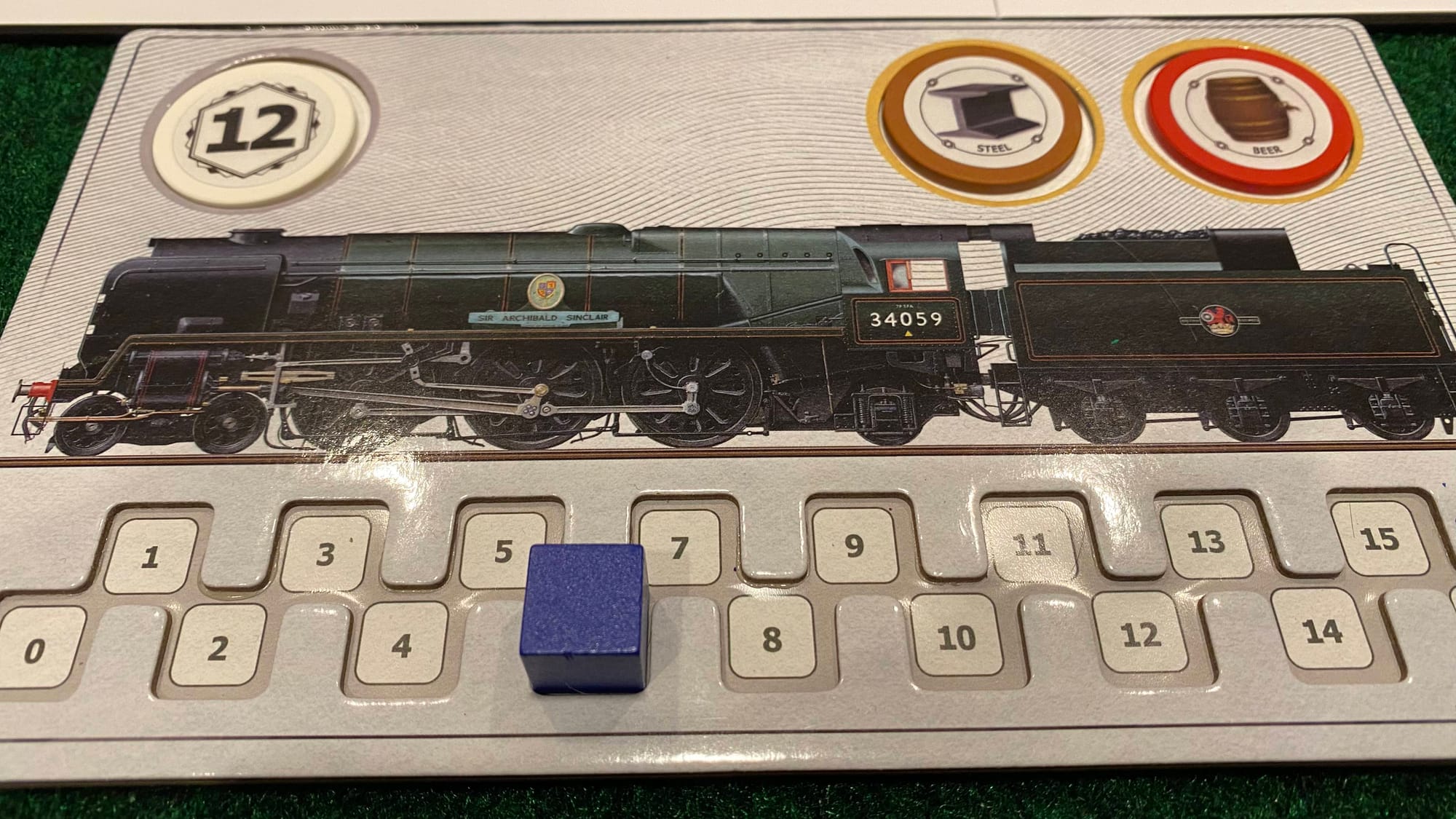 A closeup of a player board with the movement cube in use