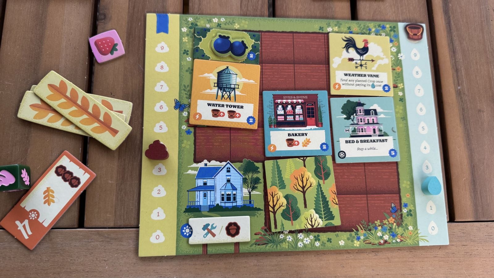 A player board for a player that focused on building tiles.