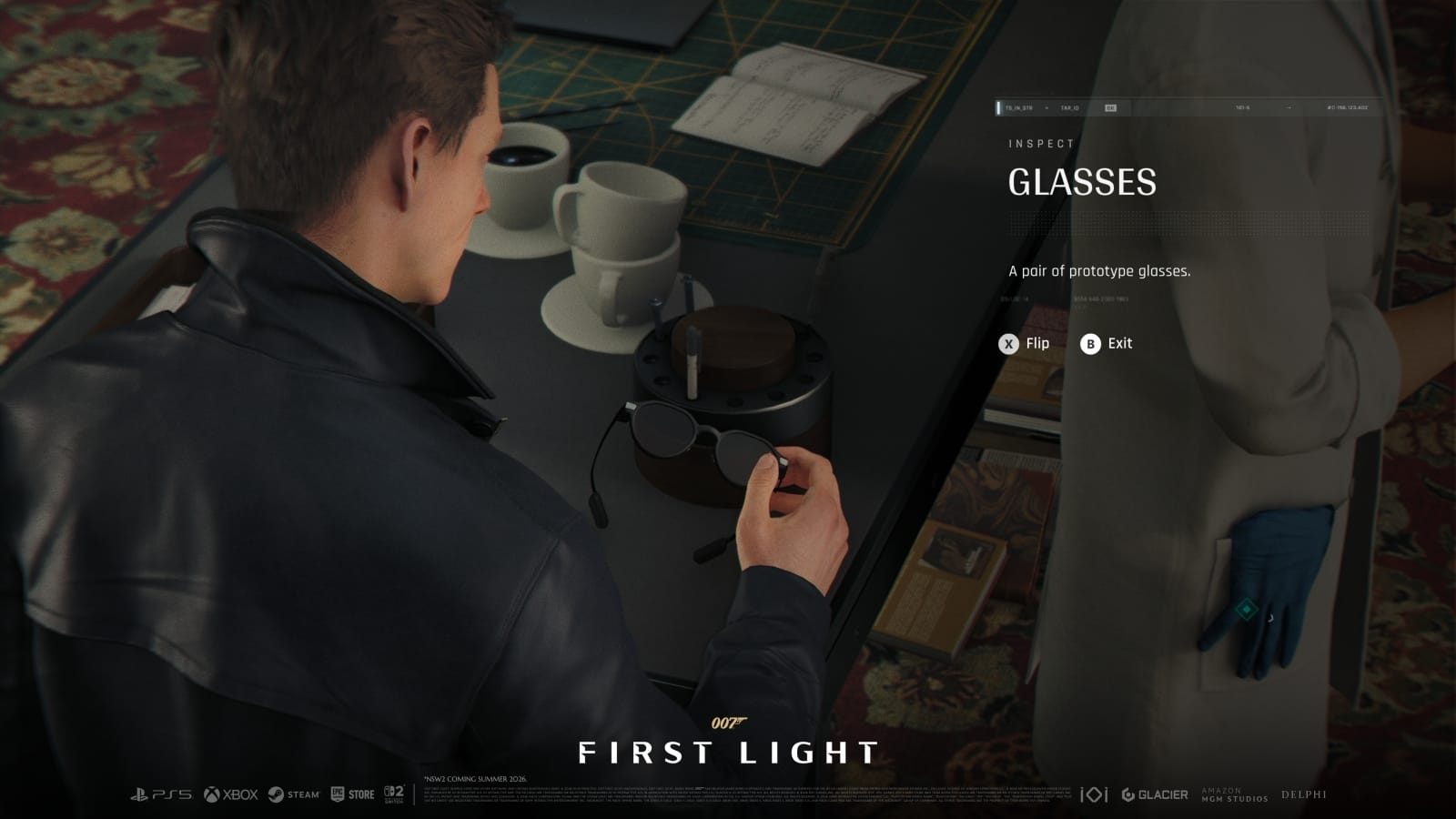 James examining some glasses.
