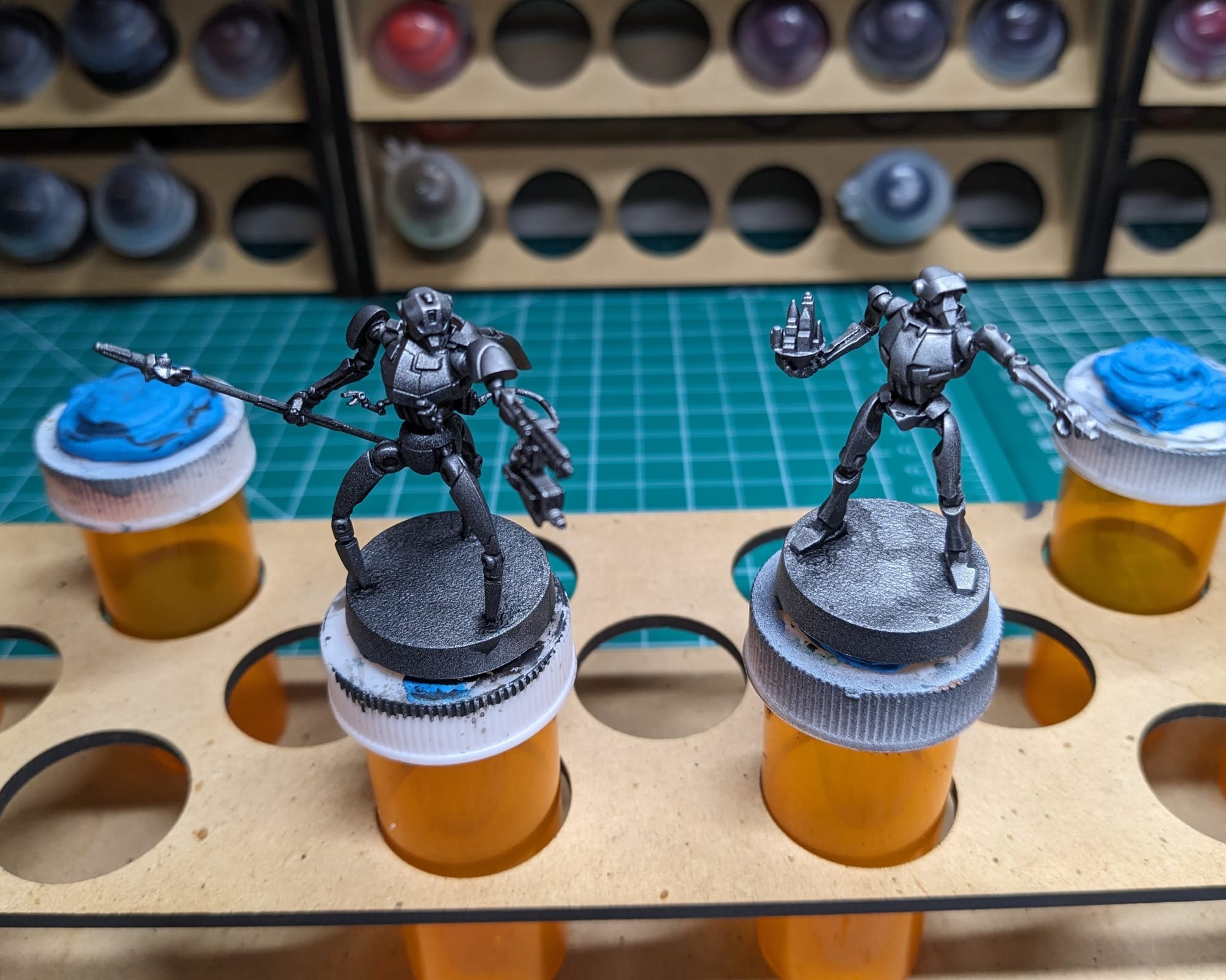 Droids primed silver with Dark Tone wash over them