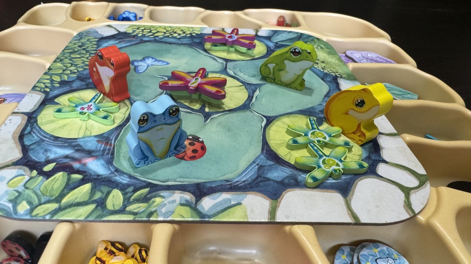 The frog pond action and token storage.