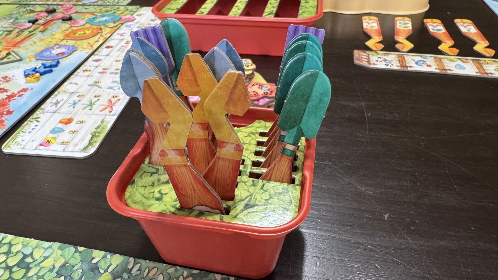 A flowre pot holding the garden tools from the game.