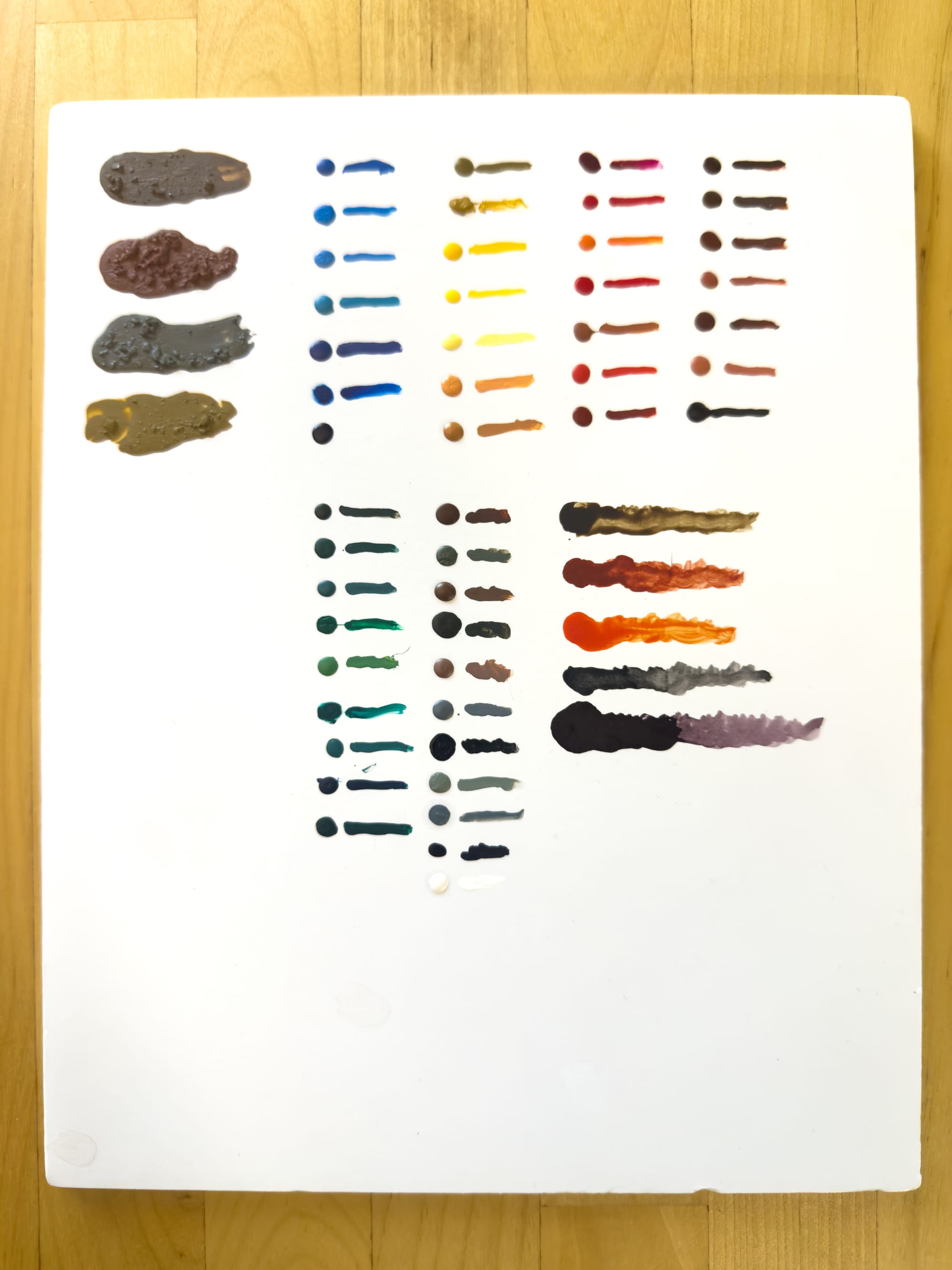 Bear Cavalry paints on white foamcore
