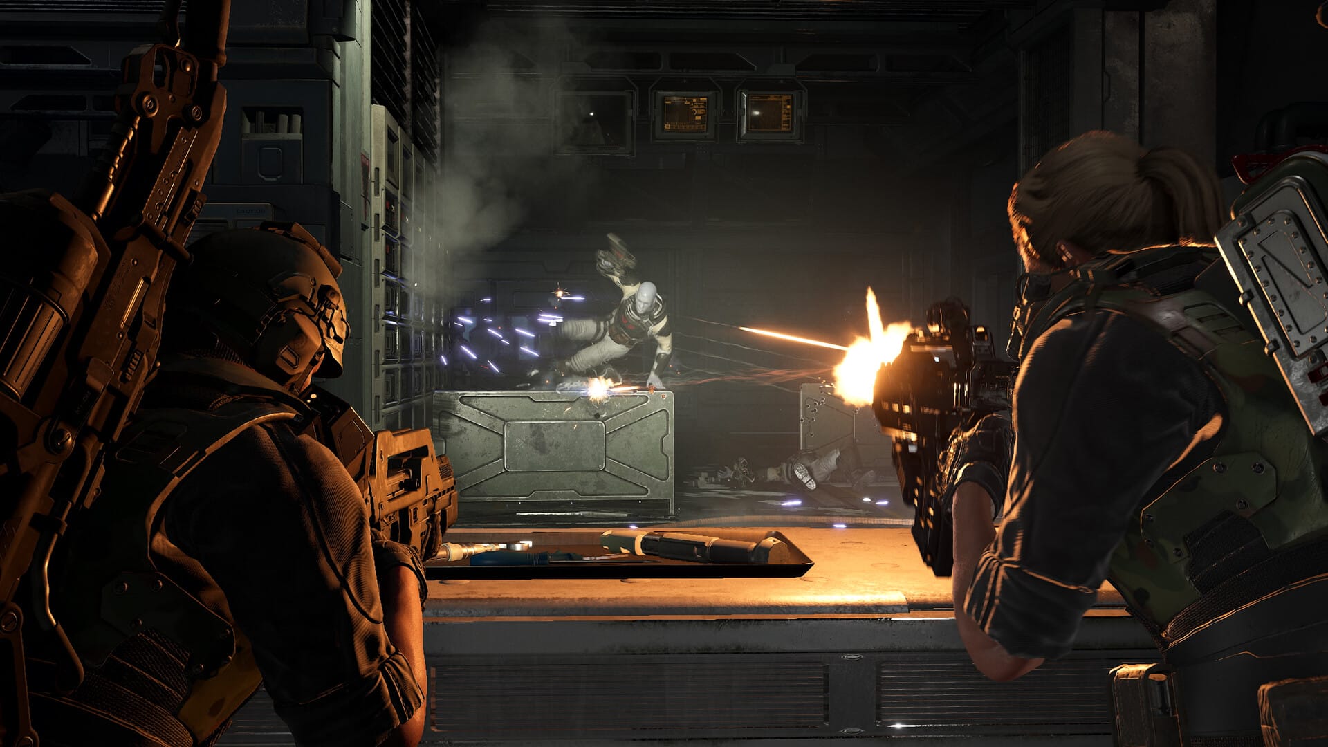 Two soldiers shooting an enemy soldier