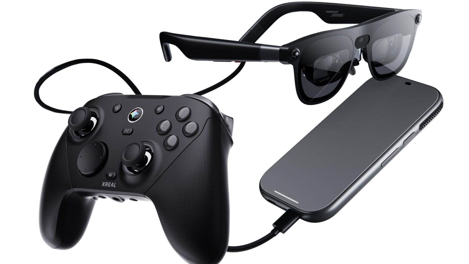 XREAL game controller beside AURA glasses and the compute puck