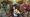 Princess Mae stands with magic wand aloft, the cast of Empiria arrayed behind her on the cover of Empiria #1