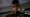 The protagonist of Mafia III looking somberly at the camera