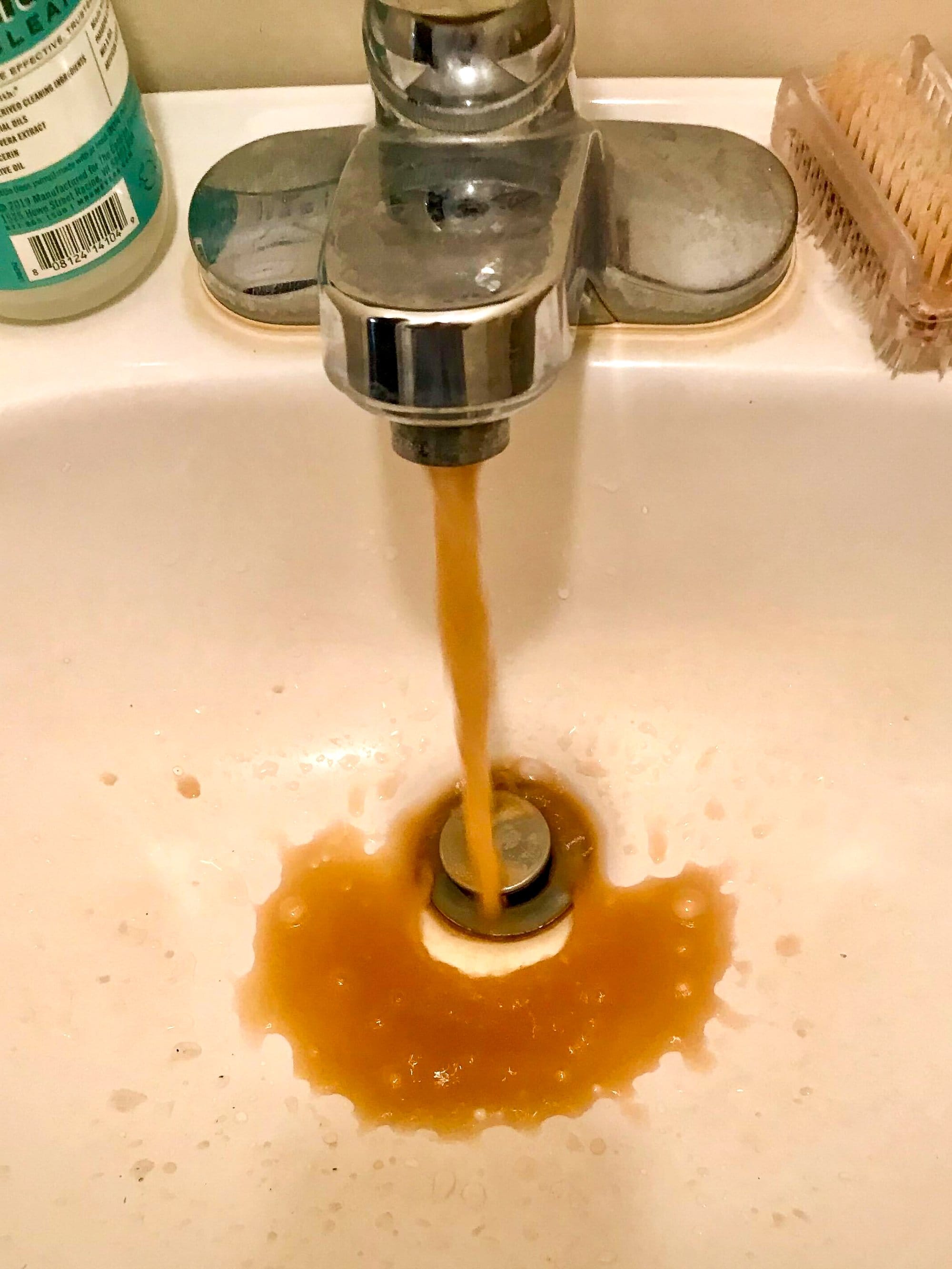 Water runs from Tallulah resident Donald Wood’s faucet in 2024, when the city’s water quality was at its worst in years.