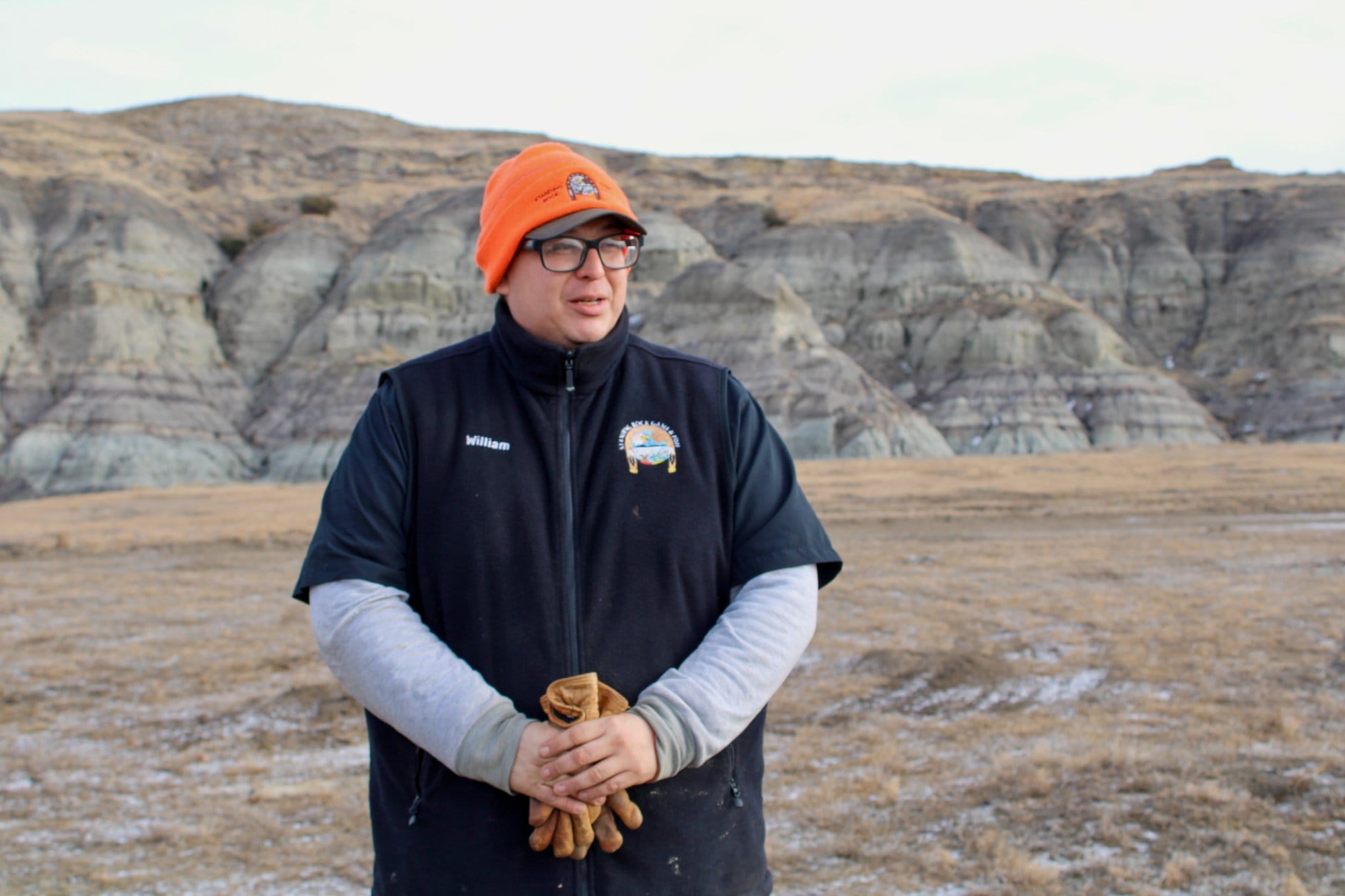 William Thompson, Standing Rock Sioux Tribe’s buffalo herd ranger, watches a group of buffalo at the tribe’s largest
