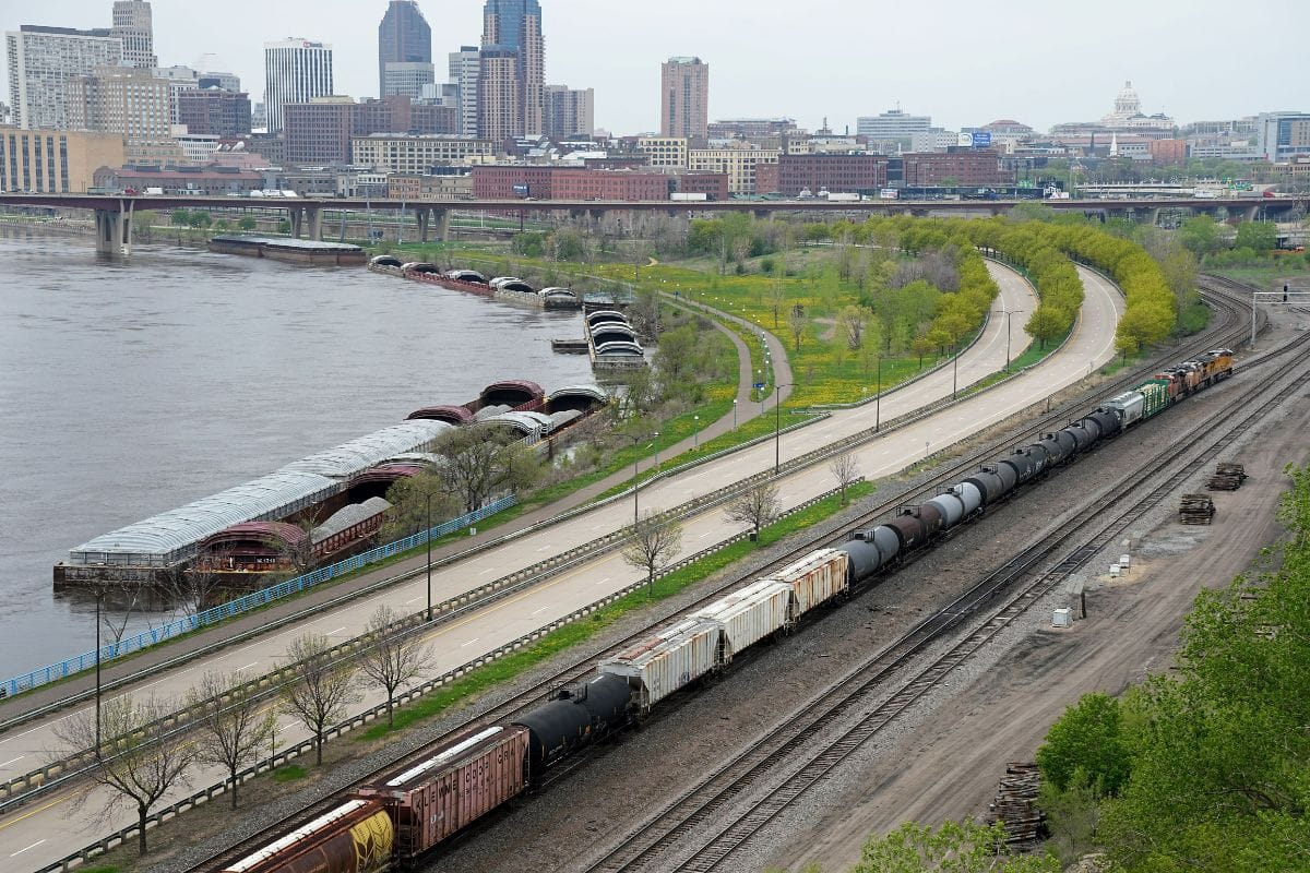 Train tracks pass along the Mississippi River
