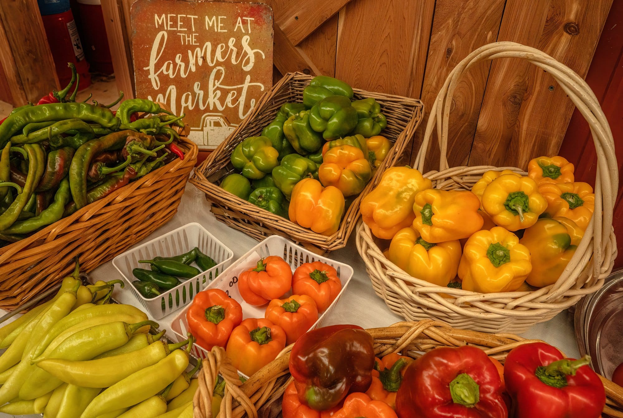 A variety of fresh peppers are for sale at Michael Katrutsa’s produce shop in rural Camden, Tennessee.
