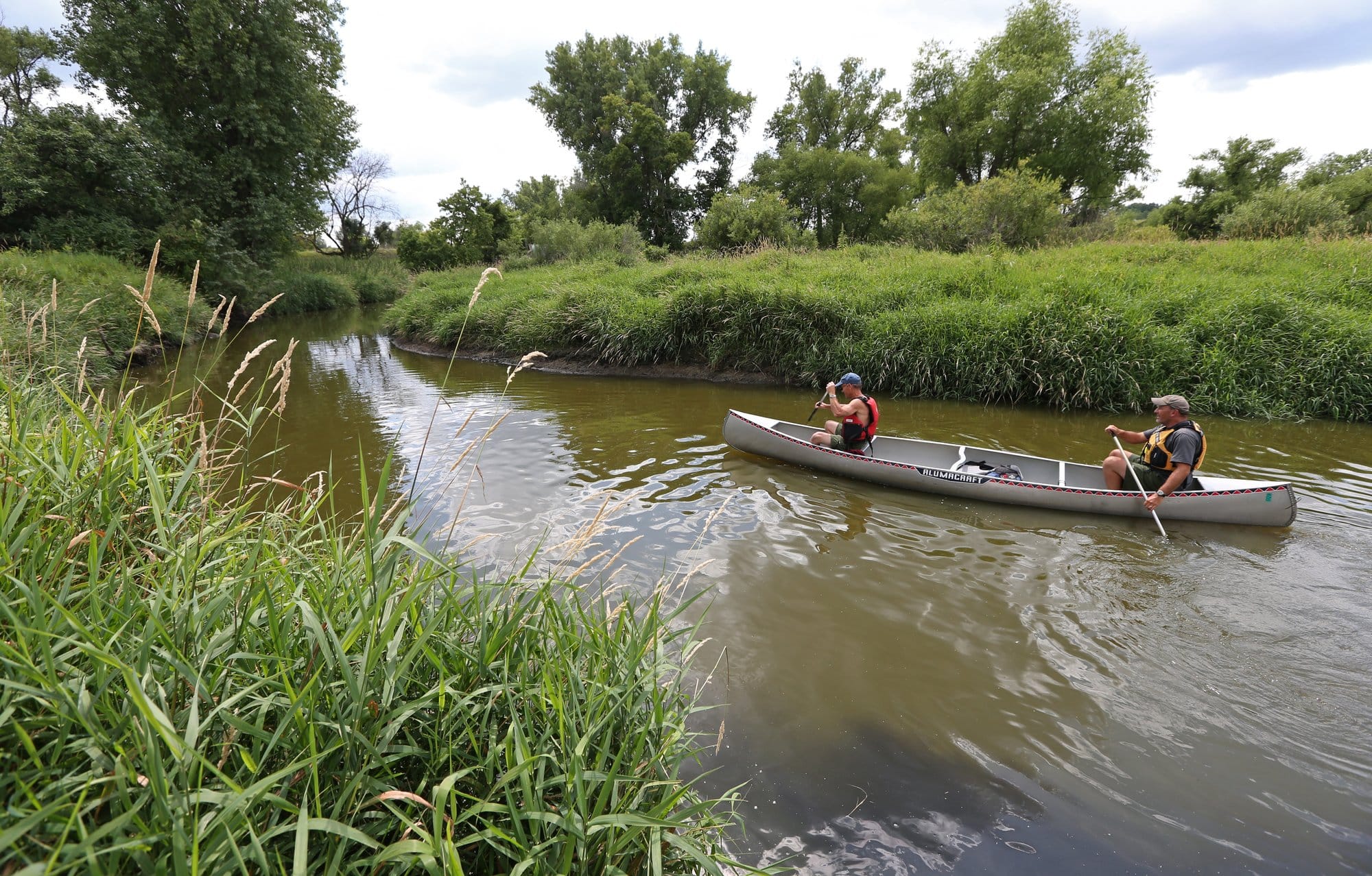 Paddlers enjoy Lakes Regional Park Preserve in Anoka County, Minn.