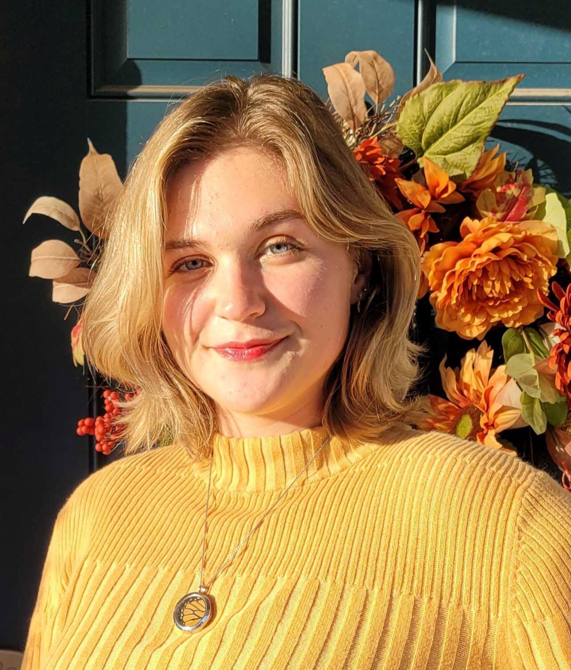 headshot of a young blonde woman