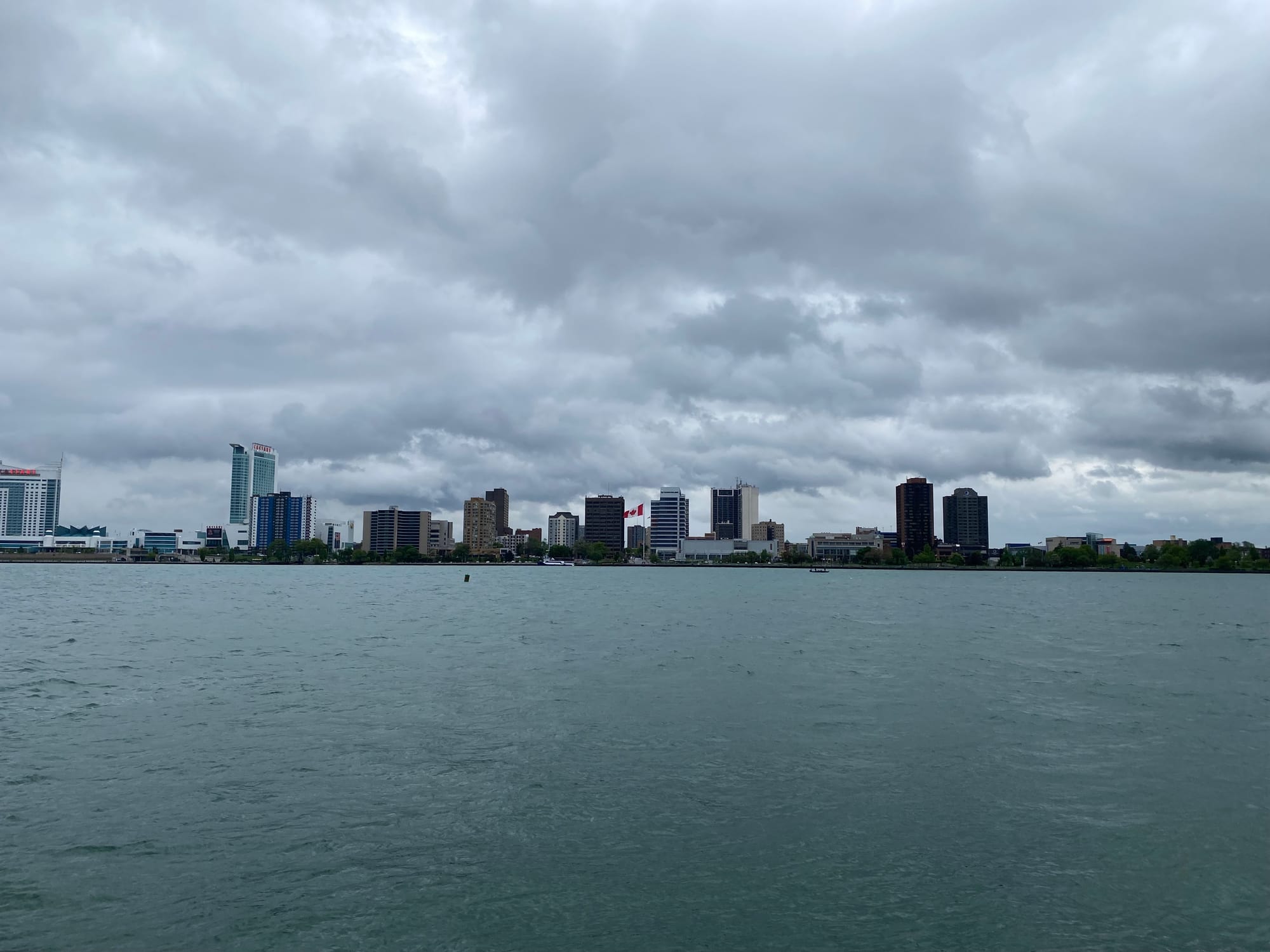 A skyline rises over the water