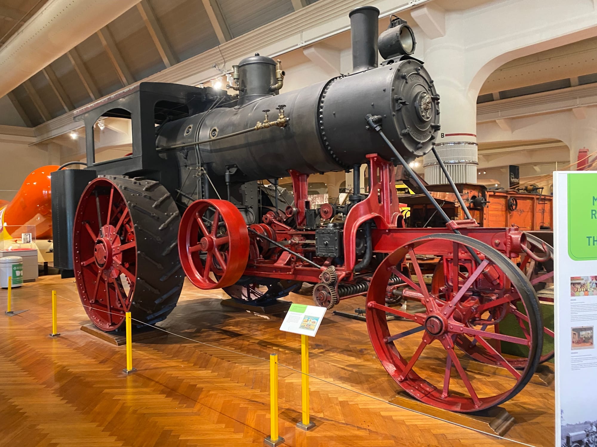 a steam engine tractor at a museum