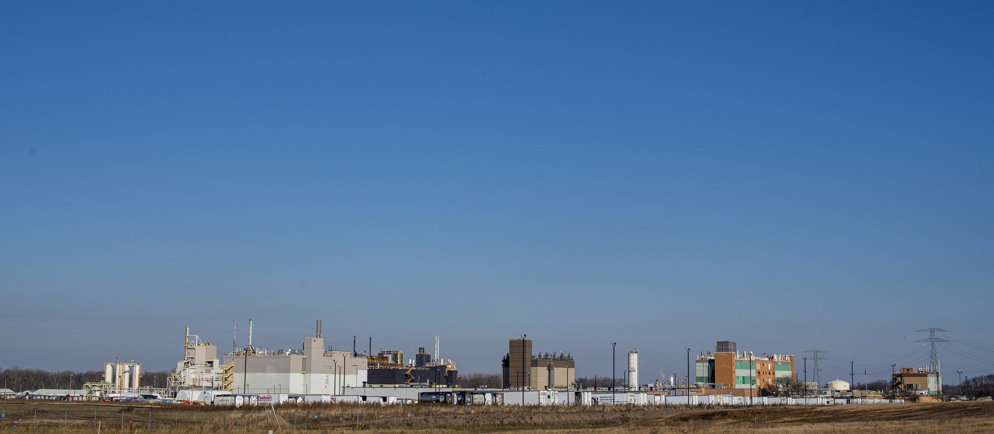 The 3M manufacturing plant near Cordova, Illinois, stretches across a flat landscape along the Mississippi River.