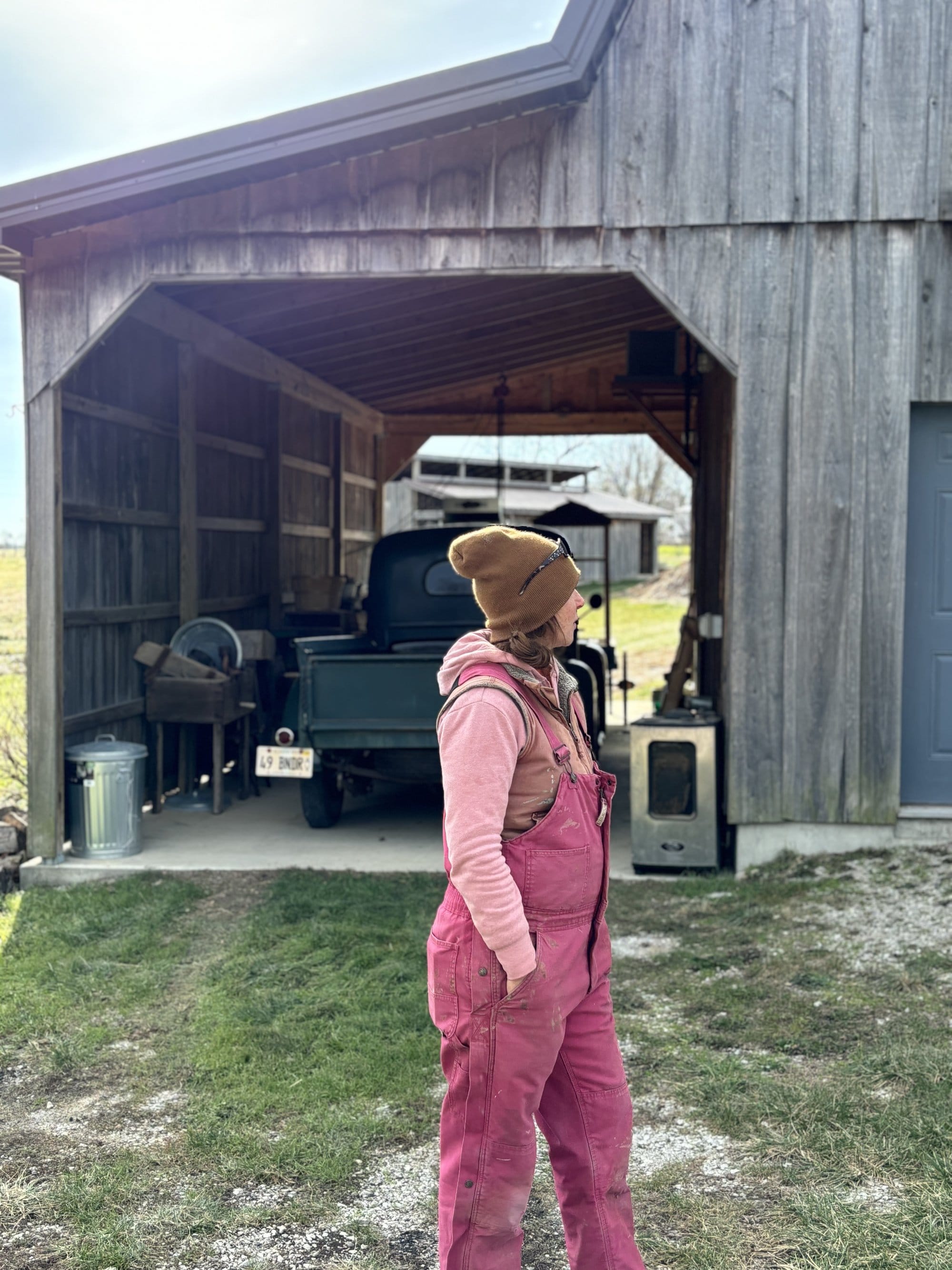 Jennifer Duensing stands in front of her classic truck on her farm in Prairie du Rocher, Illinois.