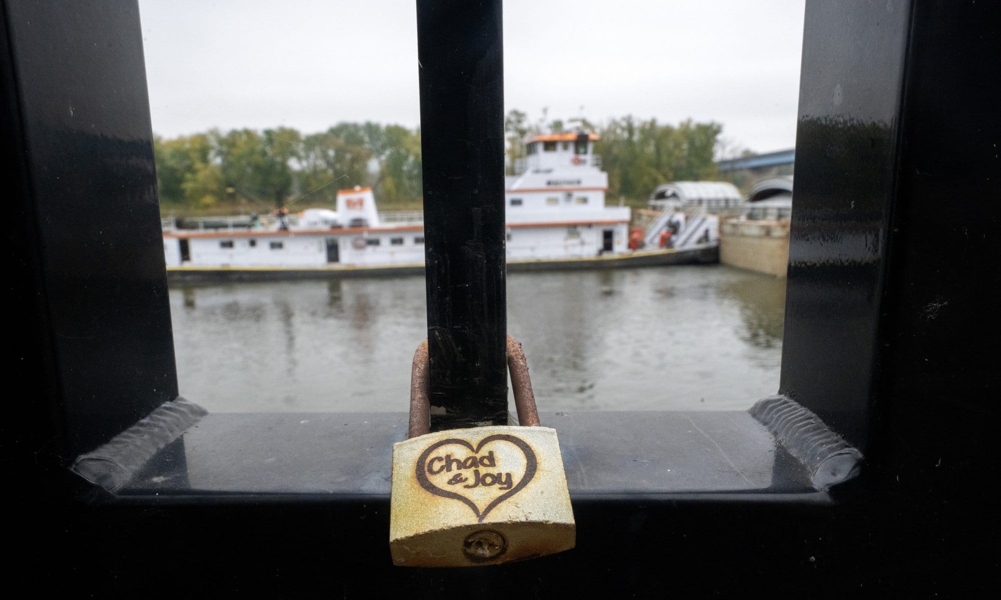 A padlock attached by lovers to an overlook on the Mississippi River is shown Oct.