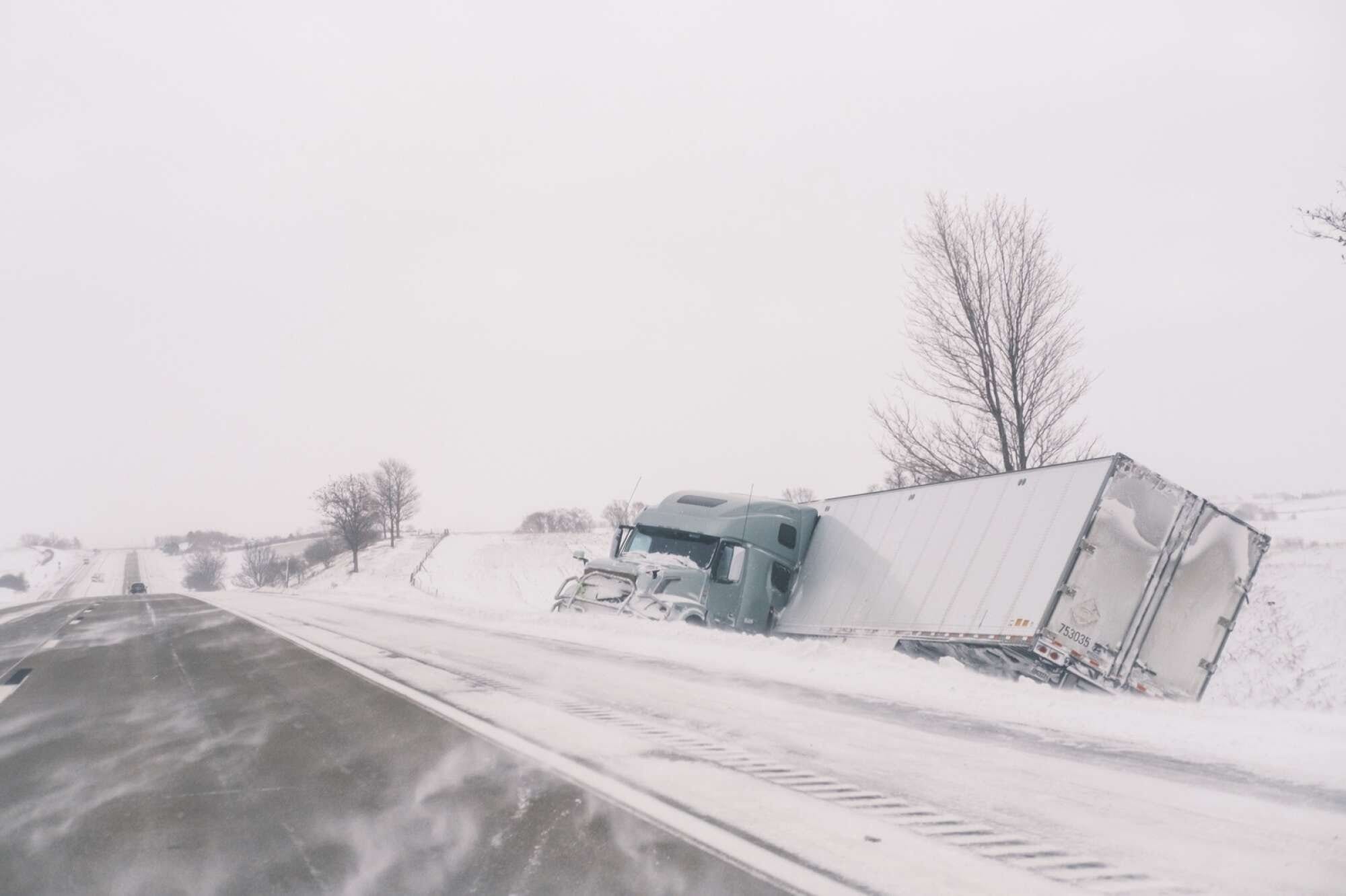 A crashed semi truck sat abandoned along Interstate 80 in central Iowa on Saturday, Jan.