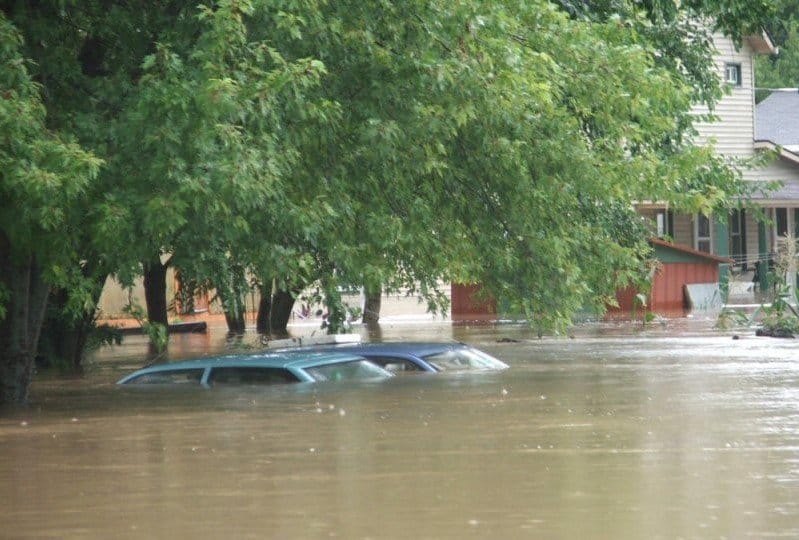 Cars are submerged in August 2007 flooding from the Kickapoo River in the small town of Gays Mills, Wis.