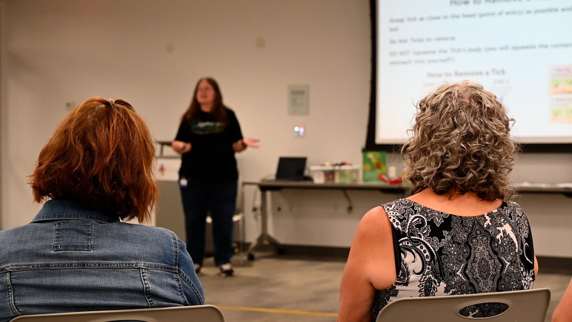 view of two women seated at a support group in a library