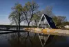 Rising Mississippi River waters approach a sand barrier at the marina in Camanche, Iowa on April 26.