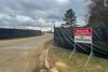 A sign outside a construction area says private property no trespassing