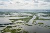 An aerial view of broken wetlands in Plaquemines Parish, Louisiana, where the Mississippi River meets the sea. 