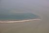 Aerial photo of Murky Mississippi River water mixes with the Gulf of Mexico at the birdfoot delta in Louisiana.