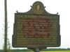 A historical sign describes the new madrid earthquake