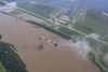 Aerial view of a freight train traveling down the river