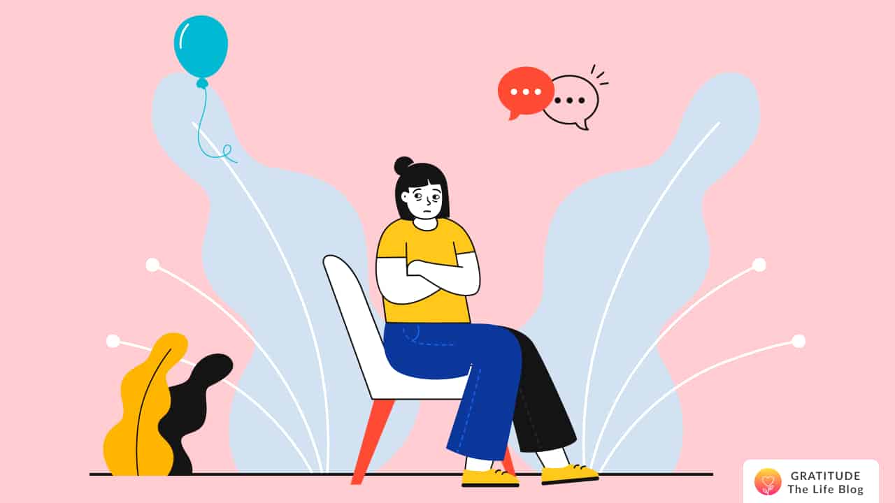 This is a woman sitting with a worried expression on her face