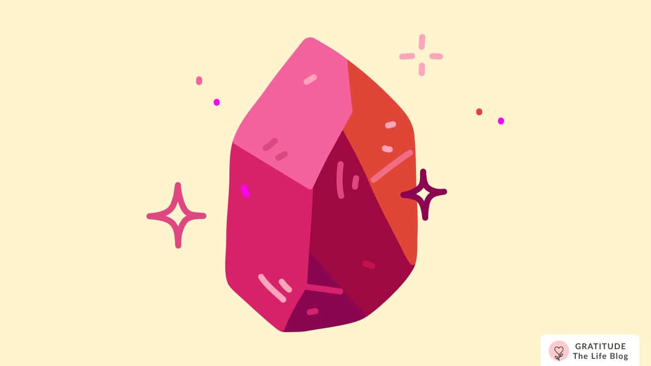 Image with illustration of a glinting red stone