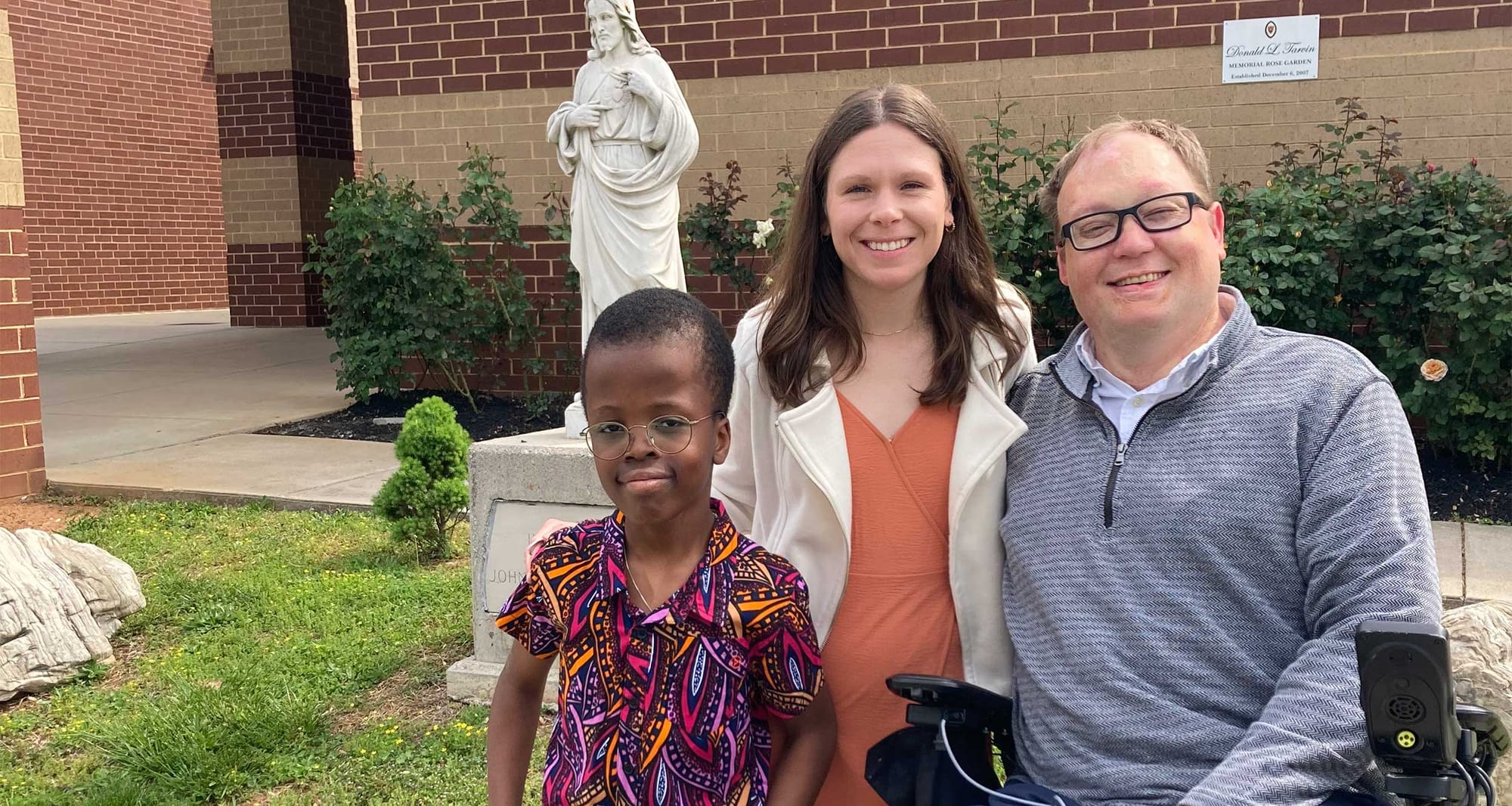 John, Stevie and Robert pictured in front of a church on Easter Sunday.