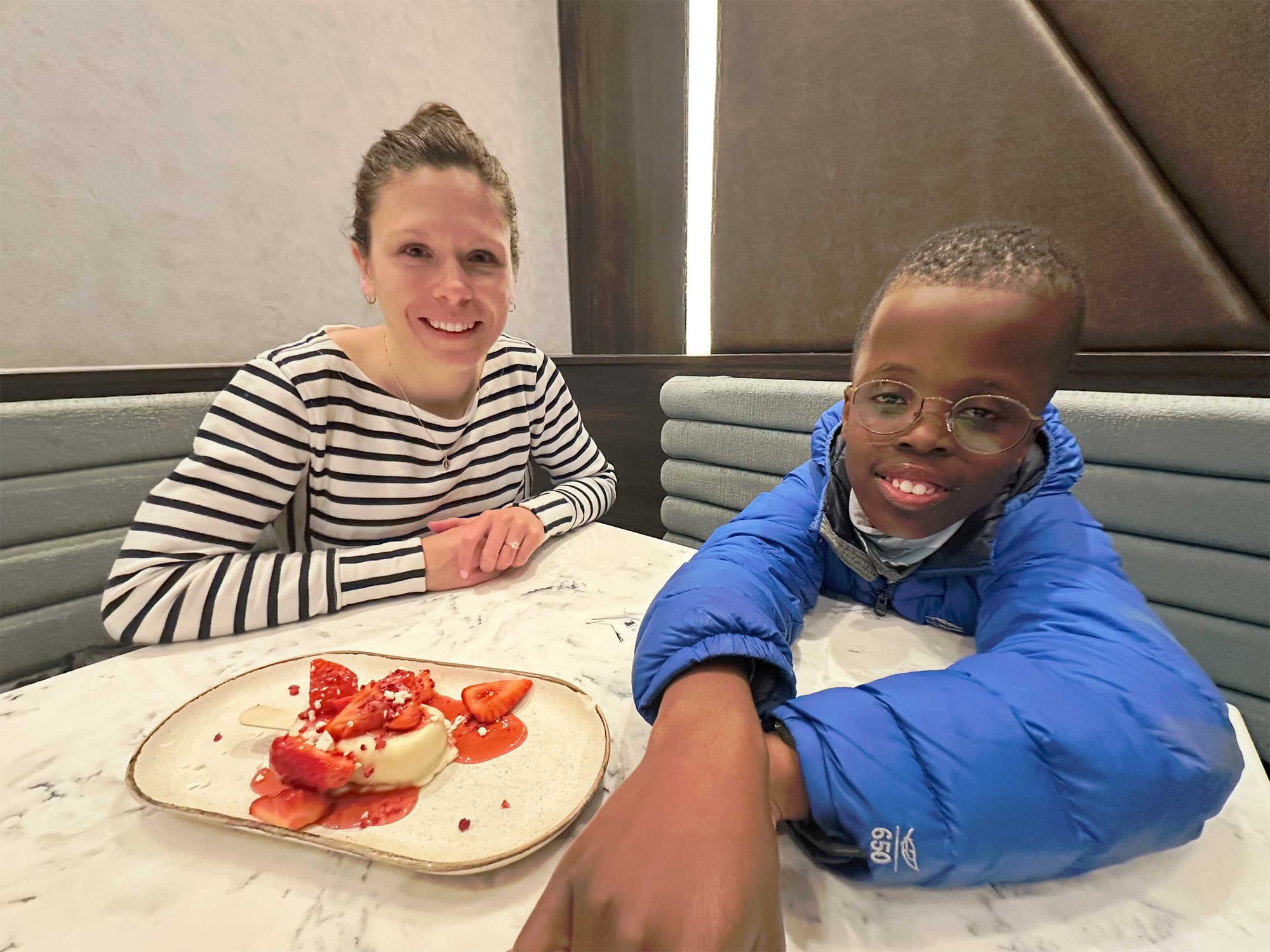 Stevie and Robert pictured with a strawberry cheesecake popsicle dessert.