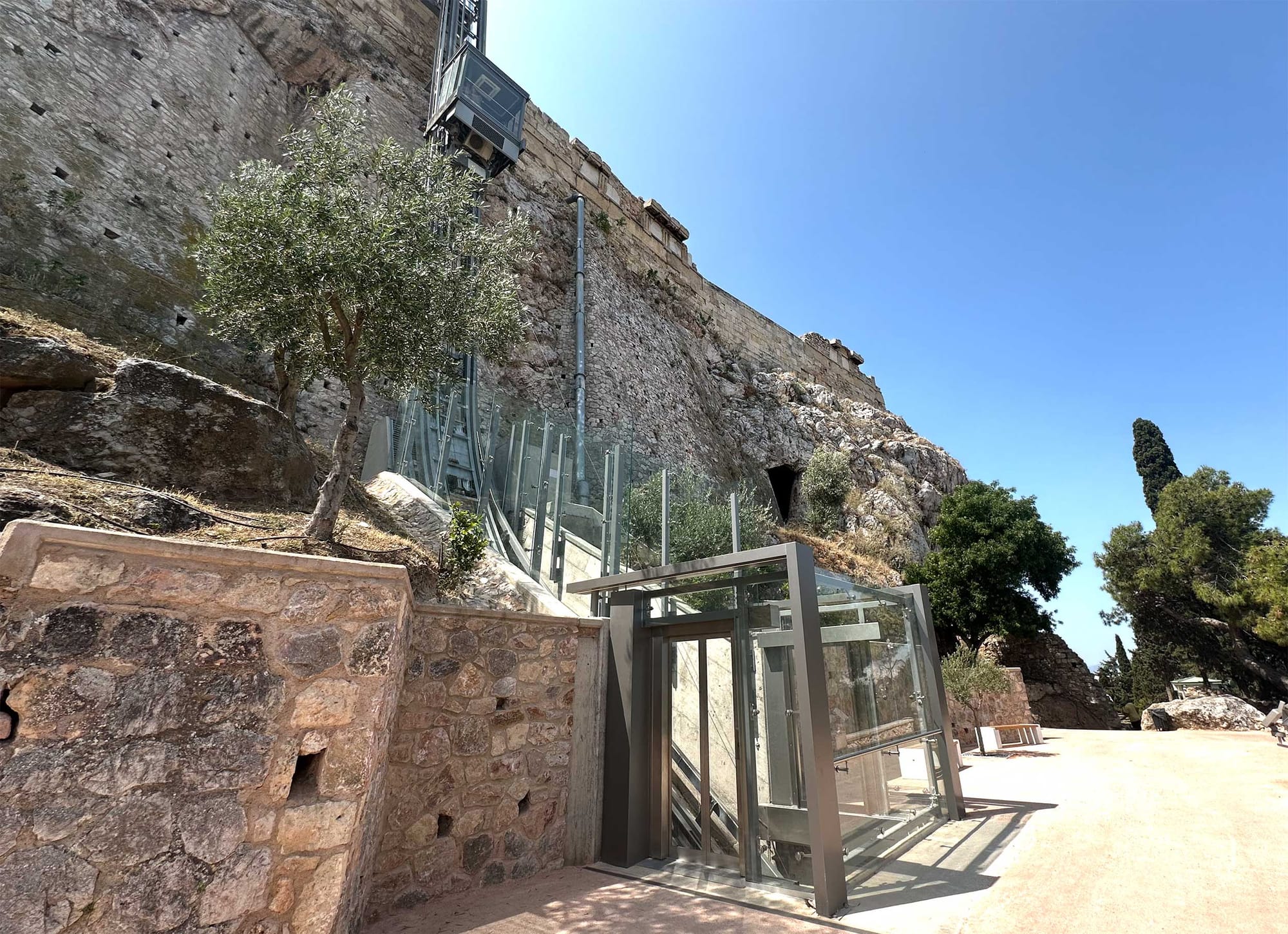Glass elevator at the Acropolis.