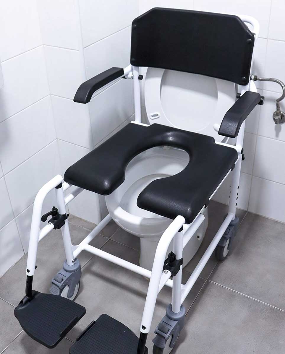 Black shower and commode chair positioned over a toilet.