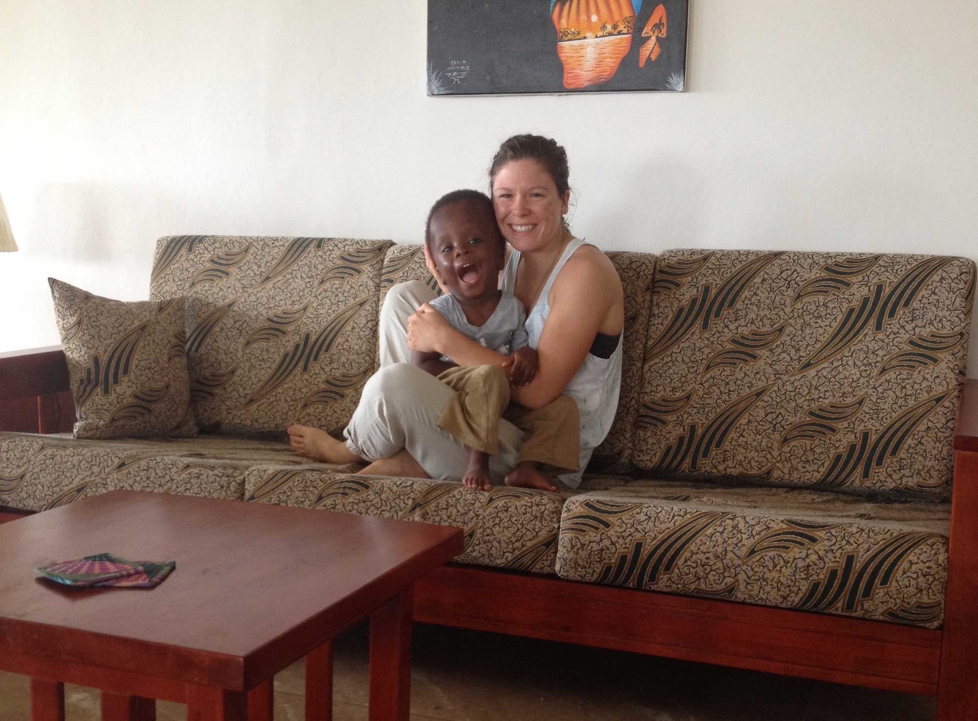 Stevie and a much younger Robert sitting on a sofa.