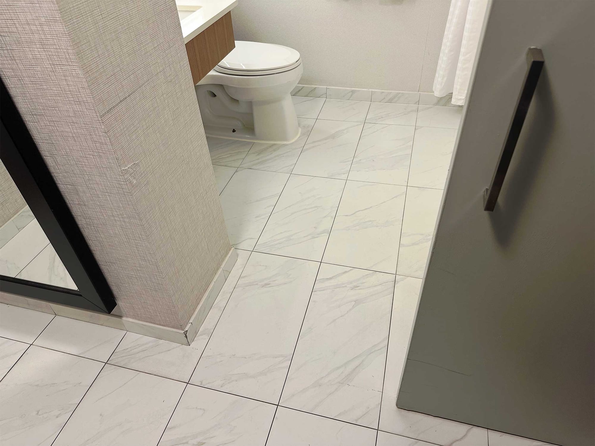 Sliding door outside bathroom.