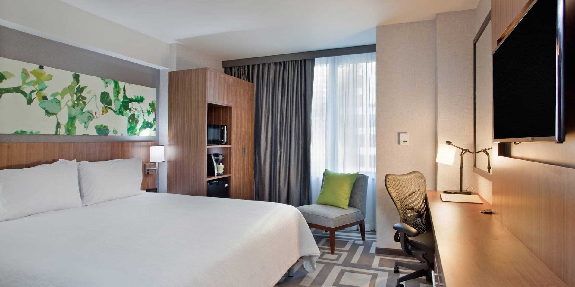 Hotel room with king size bed.