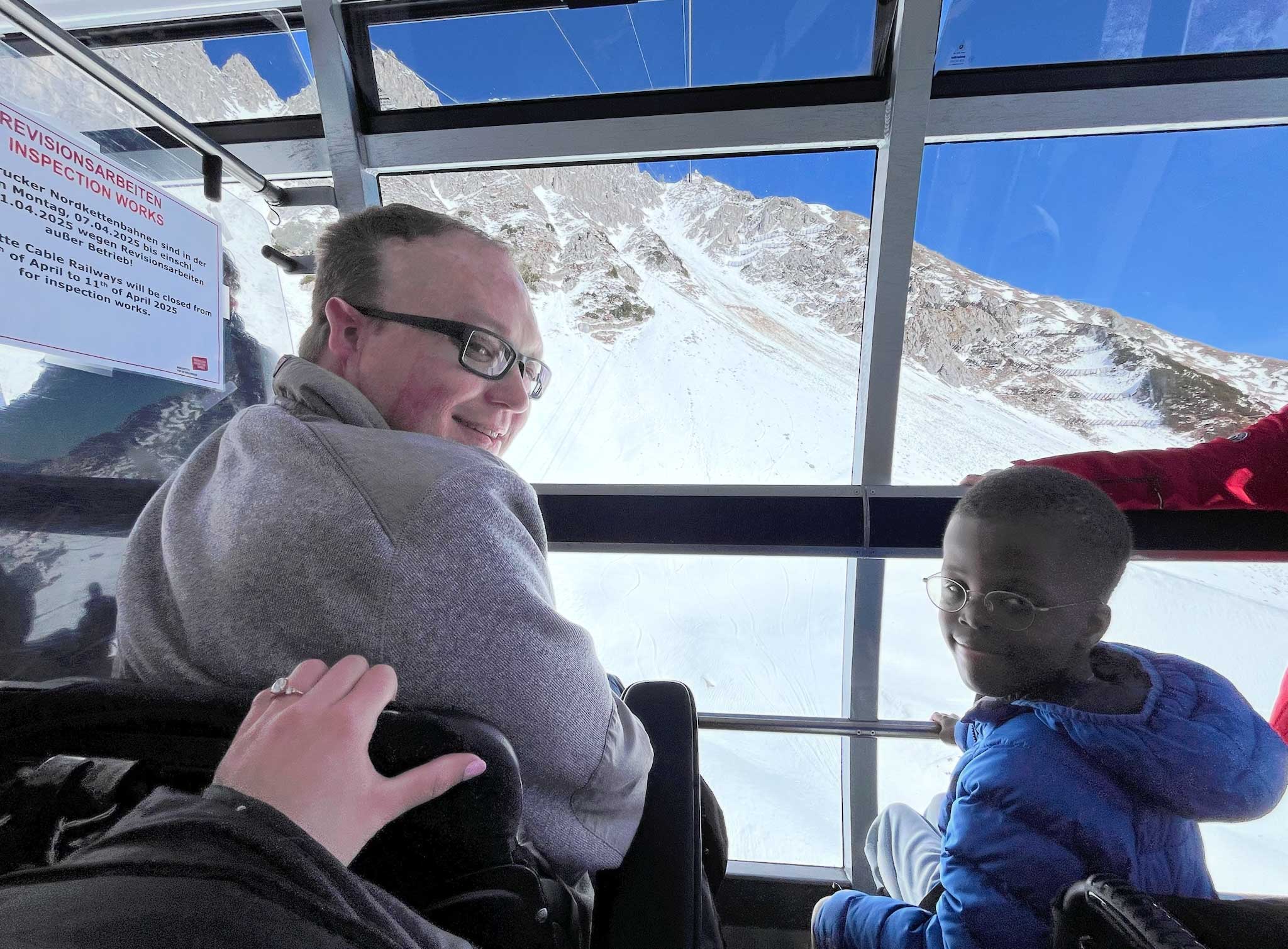 John and Robert looking out from the cable car.